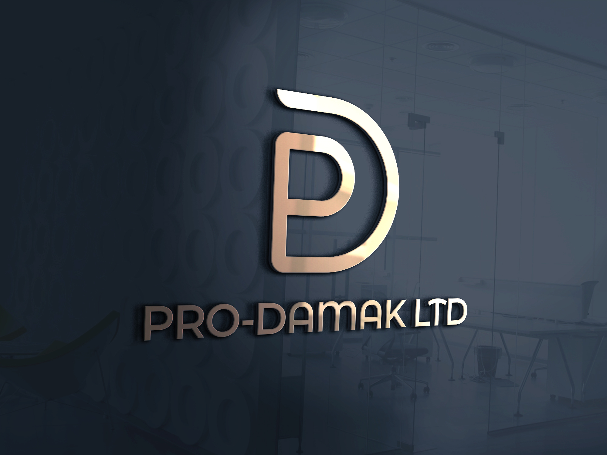 The PRO-DAMAK LTD monogram in brushed gold, mounted on a dark office wall beside a glass partition